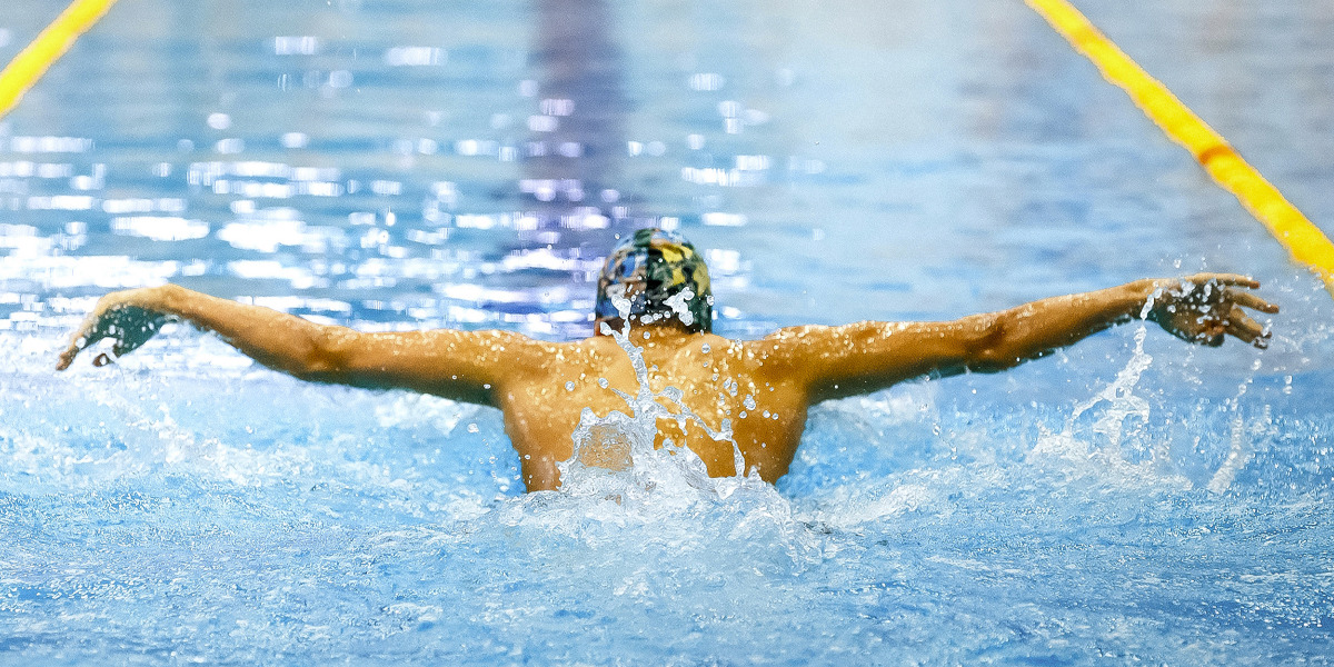 Athlète masculin, nage papillon, compétition de natation aux Jeux Olympiques